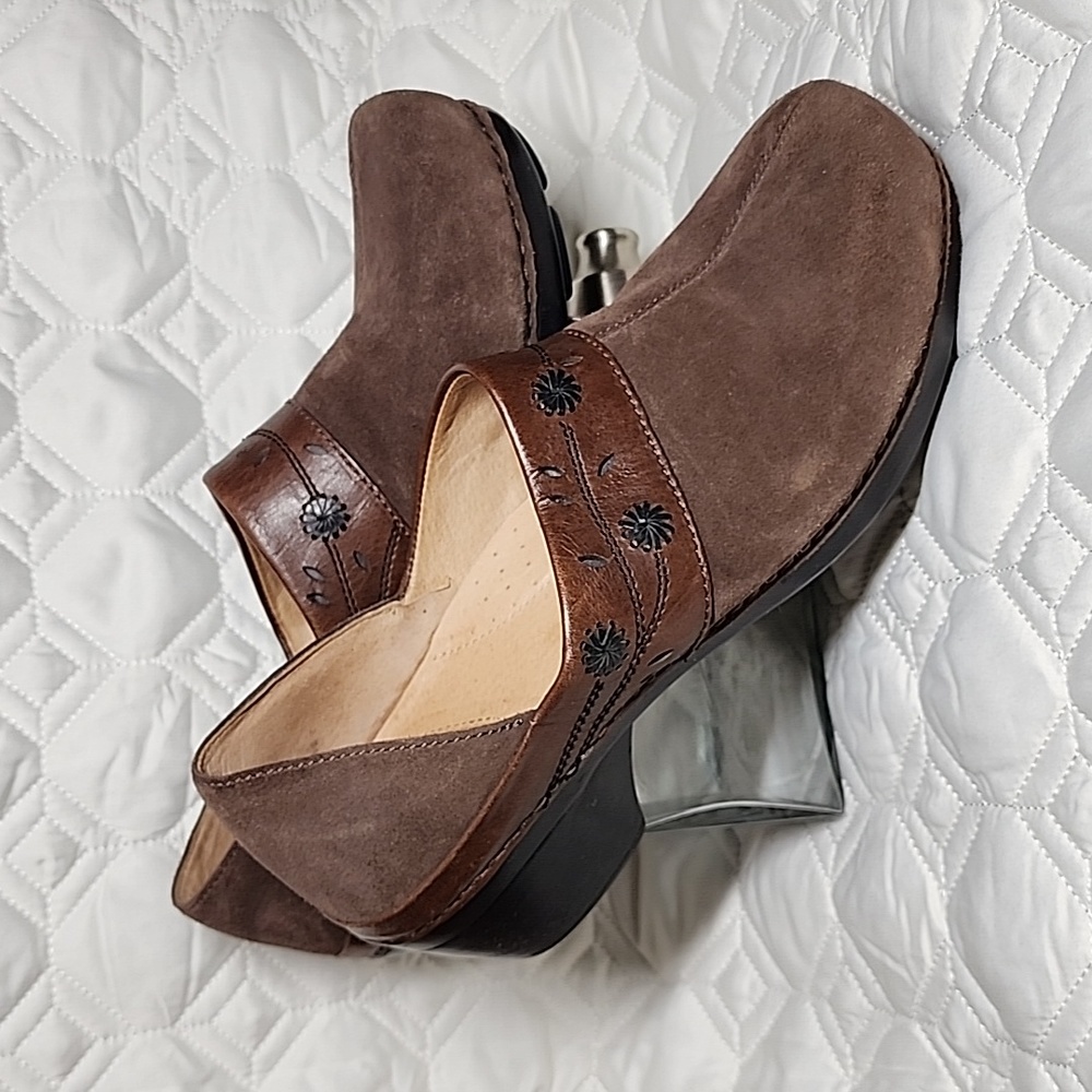 Brown suede Dansko clogs, floral details